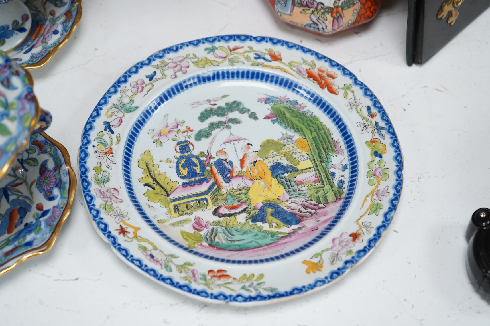 A collection of 19th century English ironstone china to include two pairs of sauce tureens, covers and stands, one marked Masons, various side plates and teacups